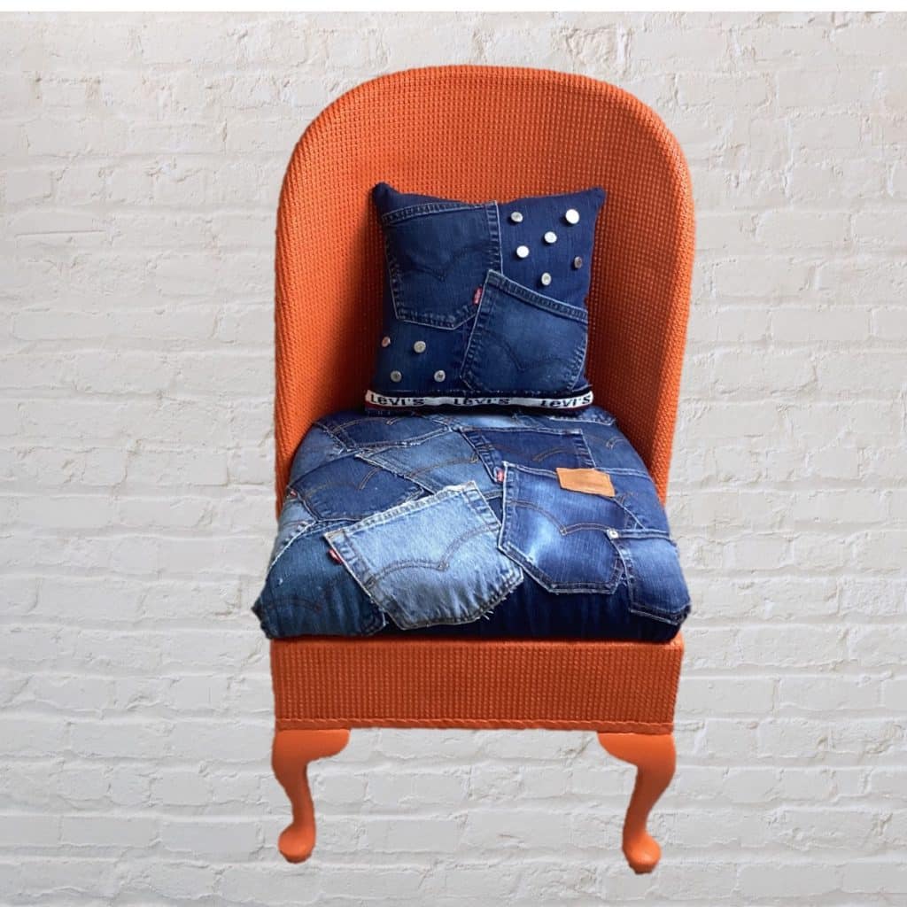 Vintage Levi's iconic Chair | Lloyd Loom Upholstered in Levi's denim Jeans pockets
