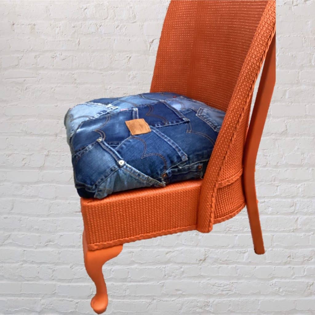 Vintage Levi's iconic Chair | Lloyd Loom Upholstered in Levi's denim Jeans pockets