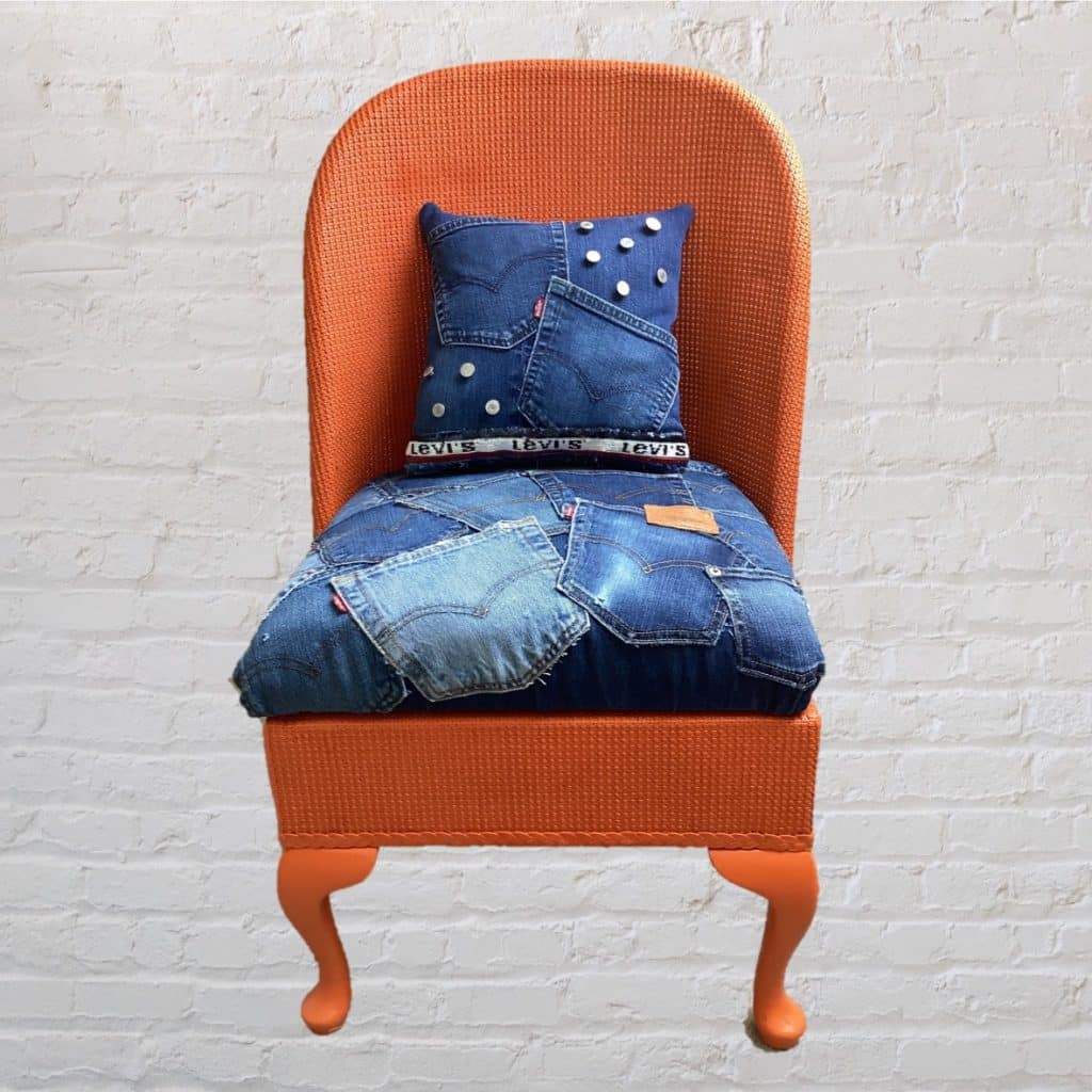 Vintage Levi's iconic Chair | Lloyd Loom Upholstered in Levi's denim Jeans pockets