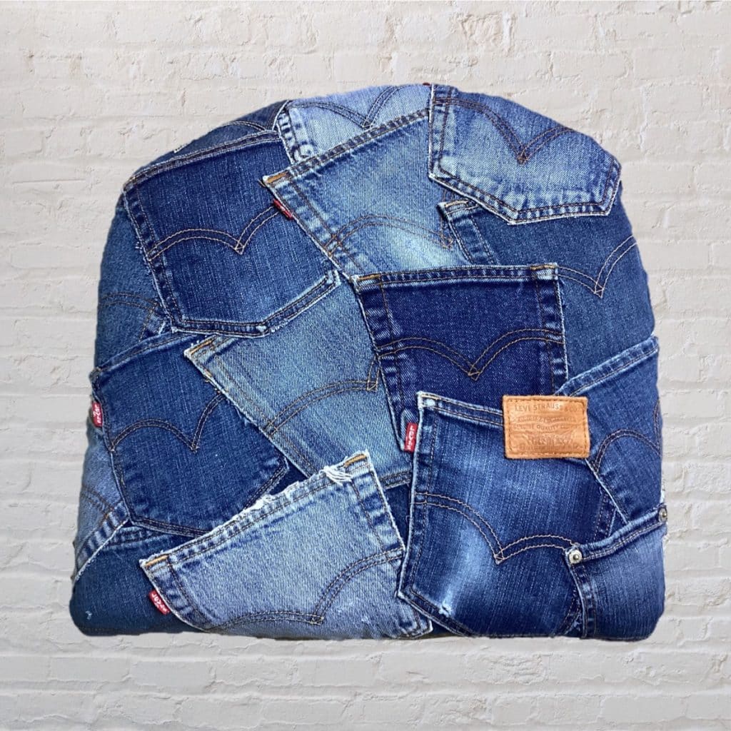 Vintage Levi's iconic Chair | Lloyd Loom Upholstered in Levi's denim Jeans pockets
