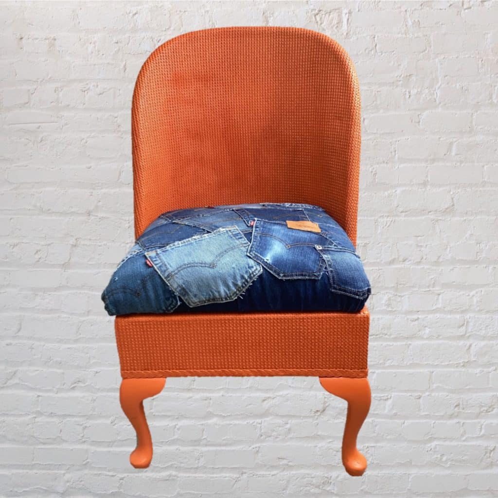 Vintage Levi's iconic Chair | Lloyd Loom Upholstered in Levi's denim Jeans pockets