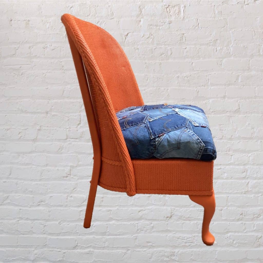 Vintage Levi's iconic Chair | Lloyd Loom Upholstered in Levi's denim Jeans pockets