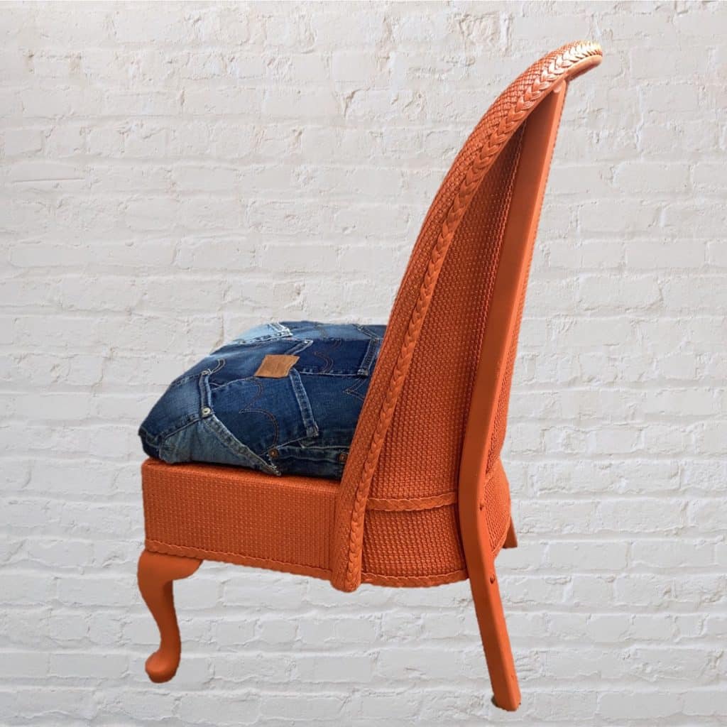 Vintage Levi's iconic Chair | Lloyd Loom Upholstered in Levi's denim Jeans pockets